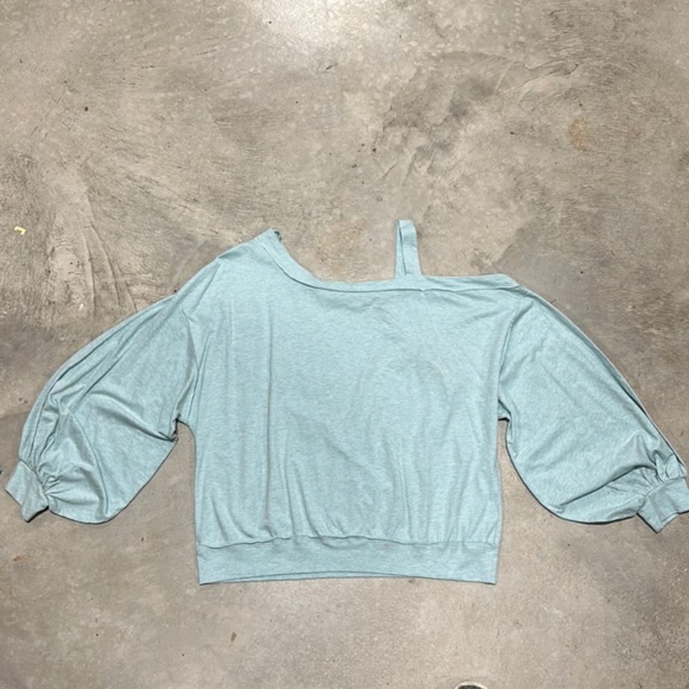 Light aqua top with strap on one‎ side / Size M / Easel brand